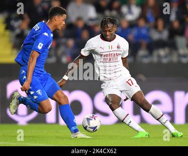 Empoli, Italy. 1st Oct, 2022. AC Milan's Rafael Leao (R) vies with Empoli's Koni De Winter during a Serie A football match between AC Milan and Empoli in Empoli, Italy, on Oct. 1, 2022. Credit: Daniele Mascolo/Xinhua/Alamy Live News Stock Photo