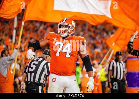 Clemson, SC, USA. 1st Oct, 2022. Clemson Tigers offensive lineman Marcus Tate (74) celebrates after a third quarter touchdown against the North Carolina State Wolfpack in the NCAA football match up at Memorial Stadiun in Clemson, SC. (Scott Kinser/CSM). Credit: csm/Alamy Live News Stock Photo