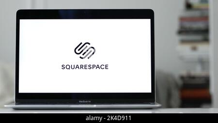 The logo of Squarespace, an American website design and web hosting company, is visible on a laptop screen in New York. Stock Photo