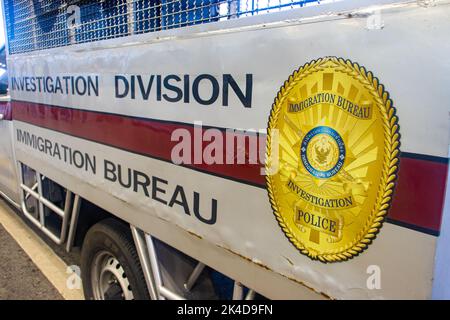 BANGKOK, THAILAND, SEP 15 2022, Emblem with inscription of the Immigration bureau of Thailand on the vehicle Stock Photo