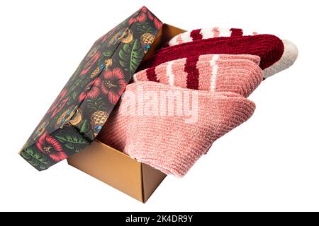 Socks set in box. Set of casual winter socks of different colors gift box isolated on white background. Stock Photo