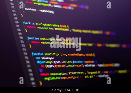 Compressed colorful Code background. Web programming with Javascript coding Stock Photo