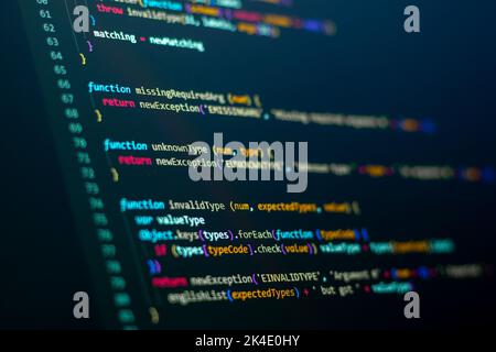 Compressed colorful Code background. Web programming with Javascript coding Stock Photo