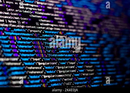 Compressed colorful Code background. Web programming with Javascript coding Stock Photo