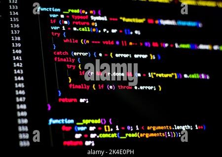 Compressed colorful Code background. Web programming with Javascript coding Stock Photo