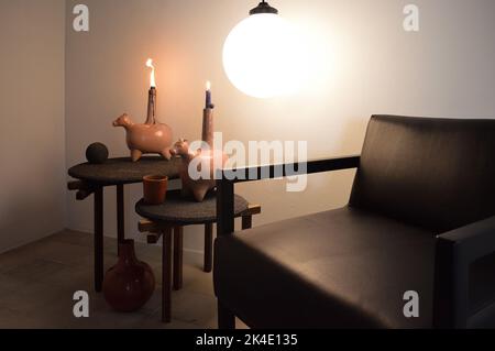 armchair, chair, individual sofa, solid natural wood structure, seat and back in natural leather Stock Photo