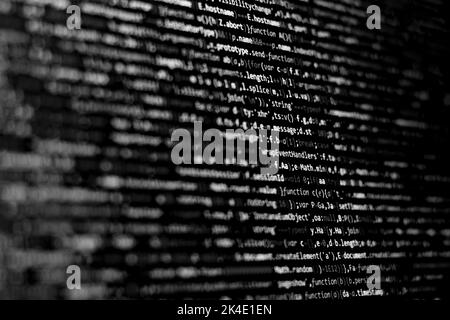 Compressed colorful Code background. Web programming with Javascript coding Stock Photo