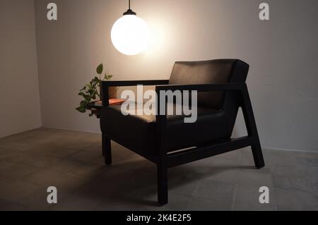 armchair, chair, individual sofa, solid natural wood structure, seat and back in natural leather Stock Photo