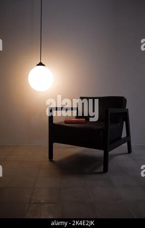 armchair, chair, individual sofa, solid natural wood structure, seat and back in natural leather Stock Photo