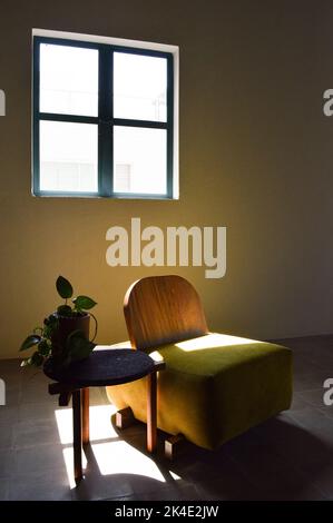 armchair, chair, individual sofa, solid natural wood structure, seat and back in fabric Stock Photo