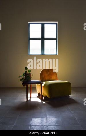 armchair, chair, individual sofa, solid natural wood structure, seat and back in fabric Stock Photo