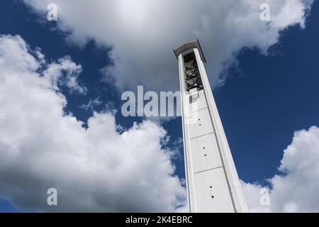 View of the bell tower of a Catholic church in a small Swiss town Olten, Switzerland. Roman Catholic parish church of the Olten quarters east of the Stock Photo