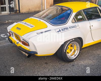 Loriol sur Drome, France - 17 September, 2022: Vintage renault alpine berlinette 1300. Old white and yellow racing car parked on the street Stock Photo