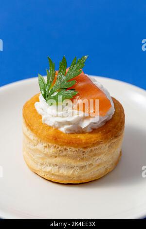 vol au vent with fish on blue background Stock Photo