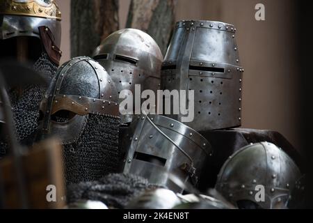 viking helmets  or armour , at their campsite , historical enactment . Stock Photo