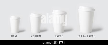 Different sized takeaway coffee cups on light background Stock Photo