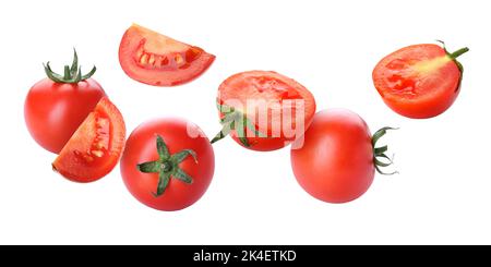 Fresh flying tomatoes isolated on white Stock Photo
