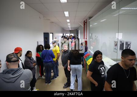 Cotia, Sao Paulo, Brasil. 2nd Oct, 2022. (INT) Brazil Elections: People with disabilities vote at an electoral college in Cotia, Sao Paulo. October 2, 2022, Cotia, Sao Paulo, Brazil: Movement in electoral zone 227, at Faculdade Rio Branco, session 321 of special people and people with disabilities, such as wheelchair user Andre Luiz Seculhano and visually impaired nun Fatima Irani Vieira, who vote through hearing system and headset, in the city of Cotia, in Sao Paulo, this Sunday (2). Today the country chooses the President of the Republic, governors, senators and federal, state and district C Stock Photo