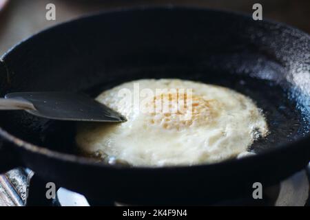 Fried eggs in the pan close up , Stock Photo