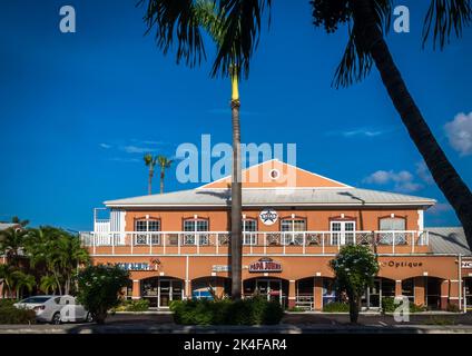 Grand Cayman, Cayman Islands, Aug 2022, view of a building with shops at Queen's Court Plaza in the George Town district Stock Photo
