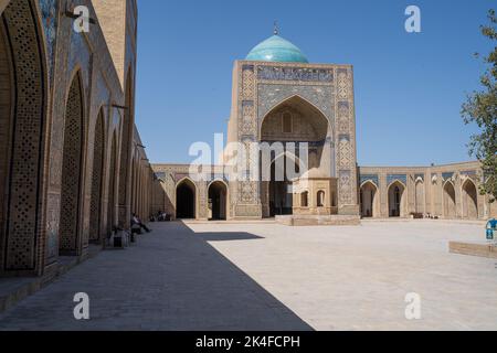 Kalan Mosque courtyard and blue-tiled dome, Bukhara Old Town Stock Photo