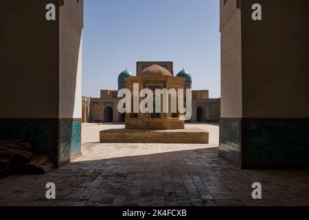 Kalan Mosque courtyard and blue-tiled dome, Bukhara Old Town Stock Photo