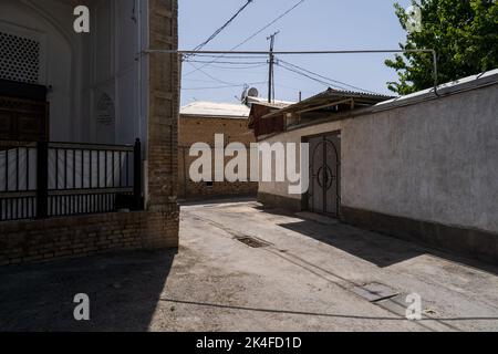 Houses in narrow streets of Samarkand mahalla. Stock Photo