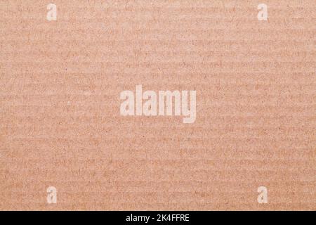 Flat Brown Rippled Cardboard Smooth Textured Background. Stock Photo