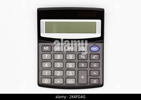 Calculator with big buttons with empty digital screen on a white background. Isolated. Solar powered financial calculator. Electronic machine for math Stock Photo