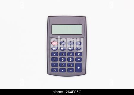 Calculator with big blue buttons with empty digital screen on a white background. Isolated. Solar powered financial calculator. Electronic machine Stock Photo
