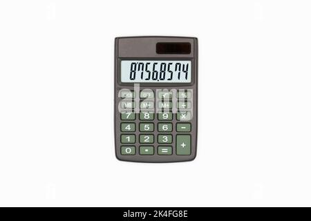 Calculator with brown buttons with numbers on the digital screen on a white background. Isolated. Solar powered financial calculator. Electronic machi Stock Photo