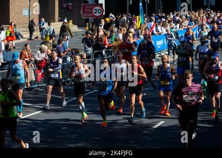 London, UK.  2 October 2022. Runners take part in the TCS London Marathon.  The 42nd event is this year sponsored by Tata Consultancy Services (TCS).  40,000 elite athletes, club runners and fun runners are taking part in the mass event.  In 2023, the race will return to its usual April date in the calendar.  Credit: Stephen Chung / Alamy Live News Stock Photo