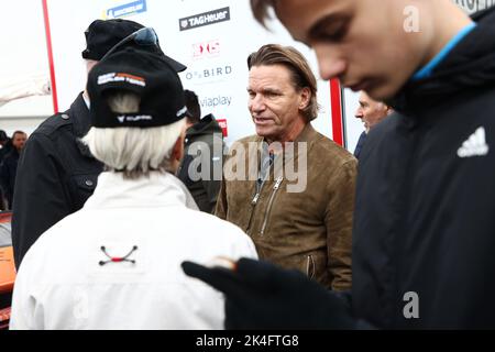 Former racing driver Stefan ”Lill-Lövis” Johansson (in the middle) during Saturday's Porsche Carrera Cup in the Grande Finale at Mantorp Park, Mantorp, Sweden. Stock Photo