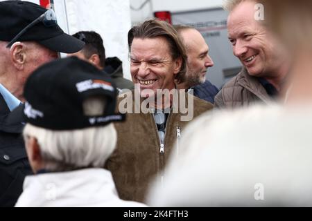 Former racing driver Stefan ”Lill-Lövis” Johansson (in the middle) during Saturday's Porsche Carrera Cup in the Grande Finale at Mantorp Park, Mantorp, Sweden. Stock Photo