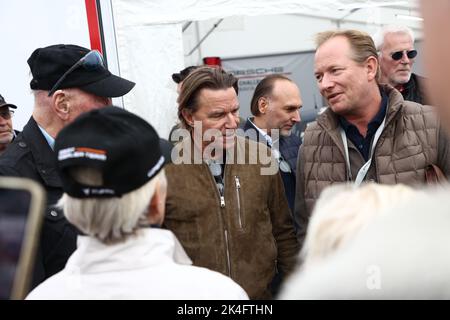 Former racing driver Stefan ”Lill-Lövis” Johansson (in the middle) during Saturday's Porsche Carrera Cup in the Grande Finale at Mantorp Park, Mantorp, Sweden. Stock Photo