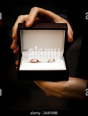 A close up of a wedding rings in a open box Stock Photo