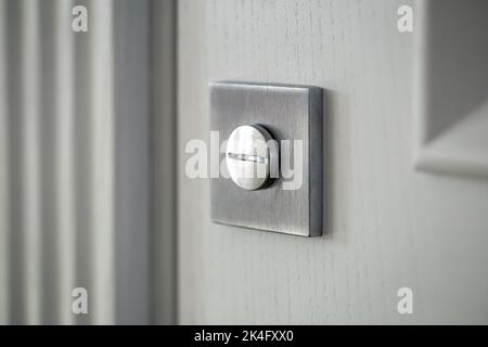 Close-up, door lock in the door, blurred background. Stock Photo