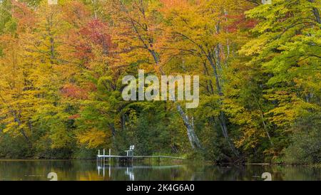 A homeowner's pier on the east fork of the Chippewa River in northern Wisconsin. Stock Photo