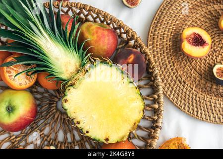 Close-up, cut pineapple and other exotic fruits. Stock Photo