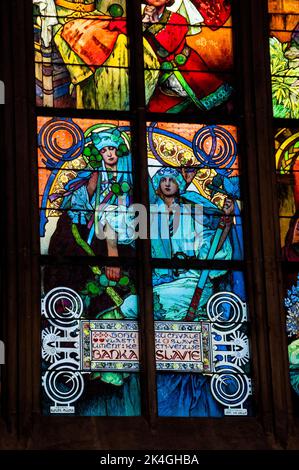 Alfons Mucha Art Nouveau window at Cathedral of Saints Vitus, Wenceslaus and Adalbert in Prague, Czech Republic. Stock Photo