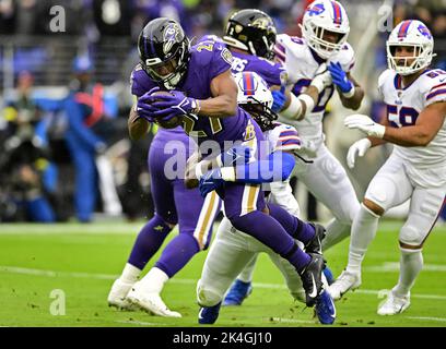 Baltimore, United States. 02nd Oct, 2022. Baltimore Ravens running back J.K. Dobbins (27) leaps away from Buffalo Bills linebacker Tremaine Edmunds (49) to score during the first half at M&T Bank Stadium in Baltimore, Maryland, on Sunday, October 2, 2022. Photo by David Tulis/UPI Credit: UPI/Alamy Live News Stock Photo