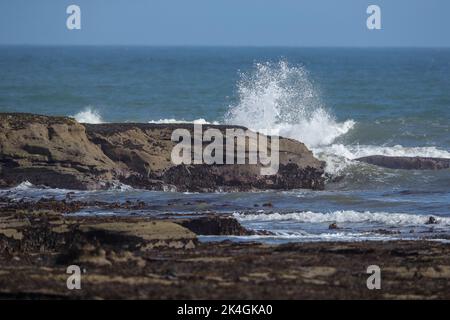 Waves breaking on Rocks Stock Photo