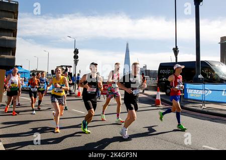 London, UK. 02nd Oct, 2022. Participants of TCS 2022 London Marathon run in central London, United Kingdom on October 02, 2022. Nearly 42 thousand runners participate in the 2022 competition. (Photo by Dominika Zarzycka/Sipa USA) Credit: Sipa USA/Alamy Live News Stock Photo