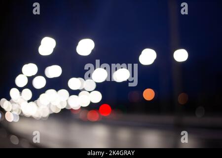 Blurred Defocused Lights of Heavy Traffic on a Wet Rainy Stock Photo