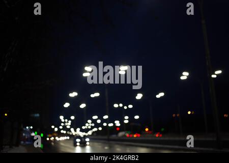 Blurred Defocused Lights of Heavy Traffic on a Wet Rainy Stock Photo