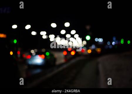 Blurred Defocused Lights of Heavy Traffic on a Wet Rainy Stock Photo