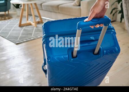 Cropped Shot Of An Unrecognizable Woman Packing Her Things Into A