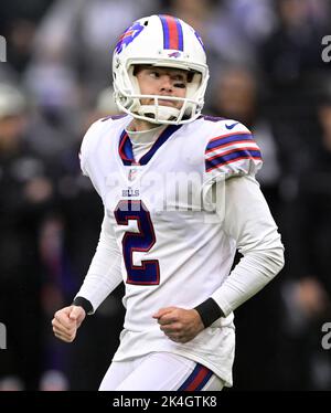 Tyler Bass of the Buffalo Bills kicks a field goal as Sam Martin