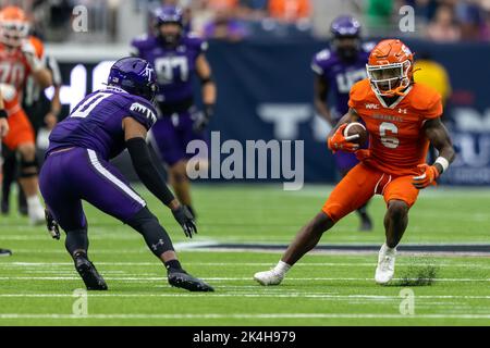 Sam Houston State Bearkats wide receiver Noah Smith (6) looks to run after the catch as Stephen F. Austin Lumberjacks safety Myles Heard (0) defends, Stock Photo