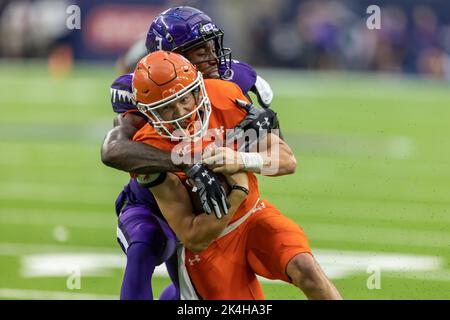 Sam Houston State Bearkats quarterback Keegan Shoemaker (5) is tackled near the endzone by Stephen F. Austin Lumberjacks defensive end BJ Thompson (3) Stock Photo
